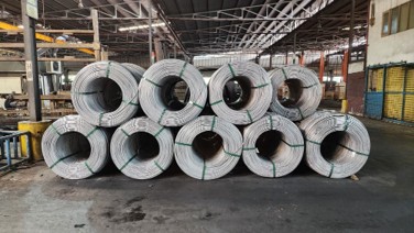 Hard drawn wire coils in warehouse
